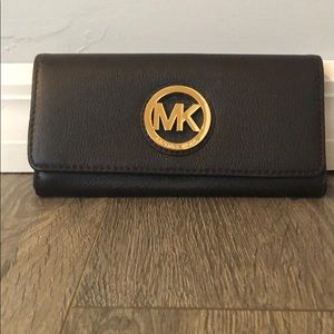 Dark brown women’s Michael Kors wallet